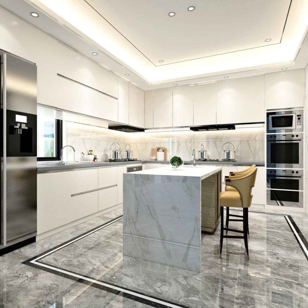 Cuisine moderne avec sol en marbre et armoires blanches.