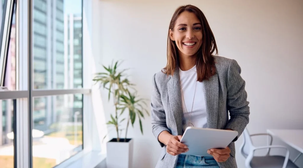 A person smiling in an office