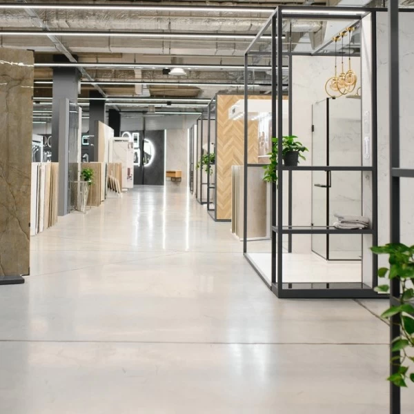 A view of a hallway in a construction shop showcasing different flooring types